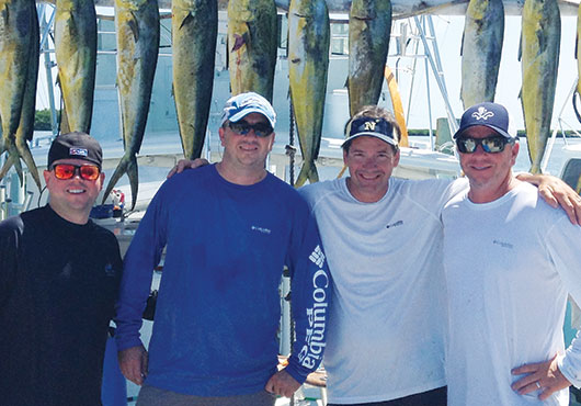 Left to right: Matt Atkinson, Keith Pruitt, Eddie McGowan and Ron Getek on a fishing vacation together in the Florida Keys in January 2015. 